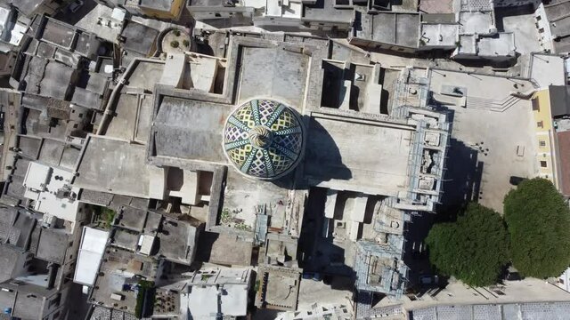 Rotating aerial view of the church in Oria Basilic Cathedral Santa Maria Assunta in Cielo