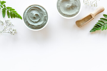 Pile of blue cosmetic clay spa beauty treatment. Top view