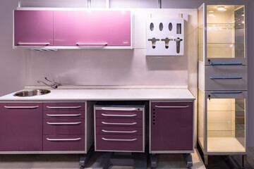 Furniture for a dental clinic. Dental furniture in raspberry color. Concept - sale of furniture for...