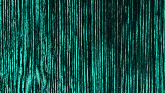 Abstract flat wooden background colored in bright turquoise, seamless loop. Animation. Vertical lines of wooden texture with a stop motion blinking effect.