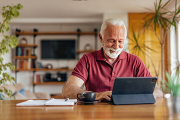 Senior man, having a business meeting, online.