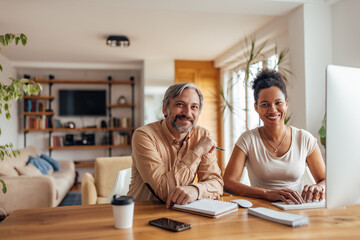 Adult business partners, having a busy day.