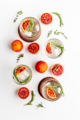 Summer cocktails with blood orange grapefruit and ice. Top view