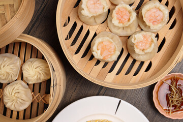 Prawn shrimp shaomai Xiao long bao dim sum dumpling chicken prawn fish seafood vegetable in bamboo...