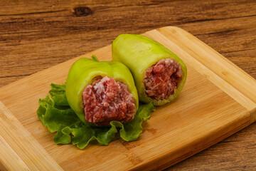 Raw stuffed pepper for cooking