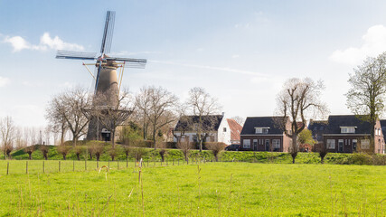 View of the windmill 'Prins van Oranje' of the picturesque old village Buren in Neder-Betuwe, Gelderland, The Netherlands.