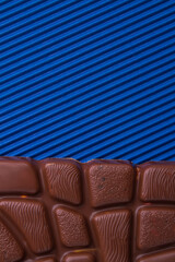 Close-up delicious milk chocolate bar and copy space.