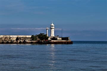 Fototapeta na wymiar lighthouse on the sea