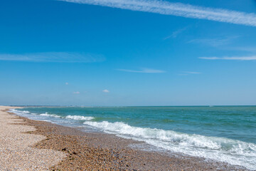 Fototapeta na wymiar beautiful empty beach on a bright sunny day in England