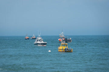 fishing boats at anchor on a calm spring day in Selsey England