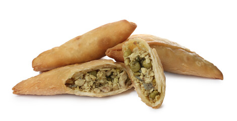 Fresh whole and cut samosas on white background