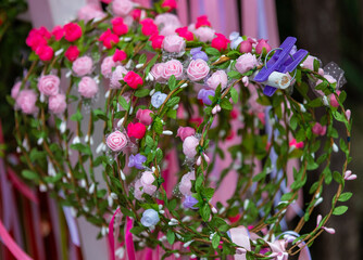 Many hung wreaths of flowers