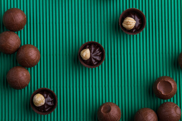 Top view flat lay assortment of sweet chocolate candies.