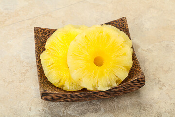 Sweet pineapple rings in the bowl