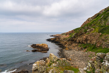 Scenic cliffs of Kullaberg nature reserve in Sweden. Popular tourist destination for hiking.