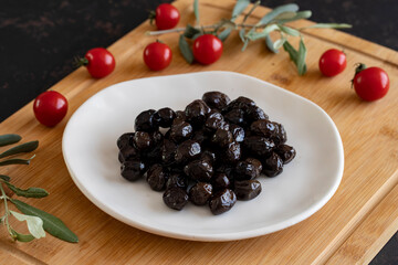Black olive. Tasty black olives in the plate.