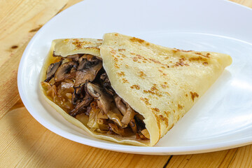 Pancake with mushroom and onion