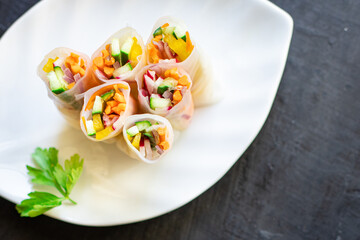 spring rolls Nem vegetables in rice paper organic dish on the table healthy food meal snack copy space food background rustic. top view keto or paleo diet veggie vegan or vegetarian food