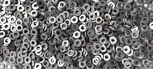 Background texture of metal nut washer. Nut washer made by steel.