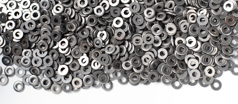 Background texture of metal nut washer. Nut washer made by steel.