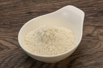 Wheat flour heap in the bowl
