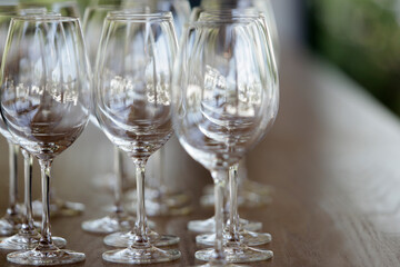 empty wine glasses on a bar