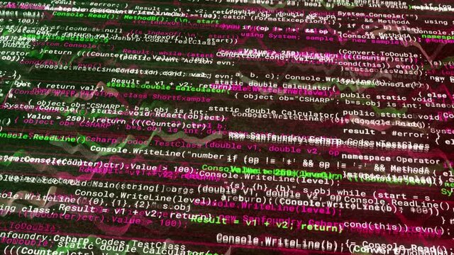 Hacking program code written on a computer screen, seamless loop. Animation. Concept of online security and cyber attack.