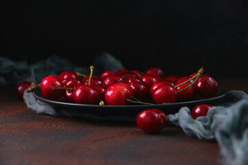 Top view on fresh, wet, dark cherries.