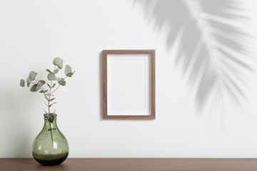 Mock up empty frame background. Empty decorative frame for a photo or painting in a light...