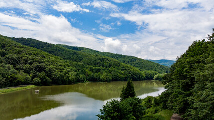 Drone footage over the mountains clouds before rain