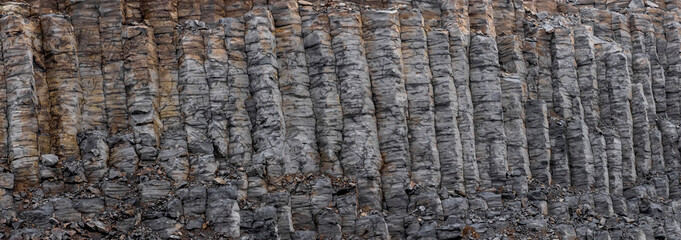 Panoramic view of tall basalt columns in Iceland