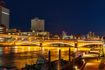 Fototapeta na wymiar イルミネーションの橋と東京都市　夜景