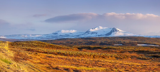 Panoramic view of Snow capped mountains in Iceland