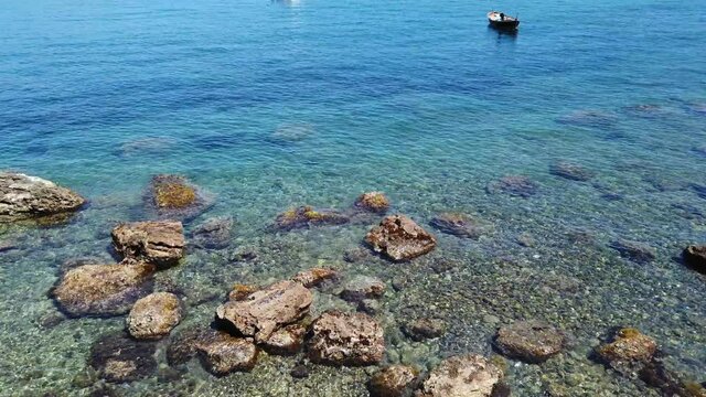 Europe, Italy , Genoa, Santa Margherita Ligure, the amazing beach and sea coast in Paraggi with clear green water during the summer after finish of lockdown due Covid-19 Coronavirus epidemic   