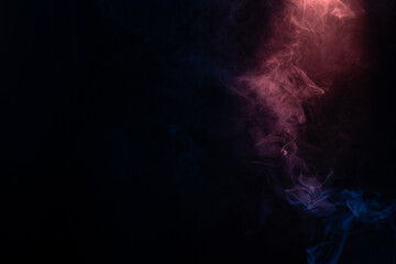 Blue and pink steam on a black background.