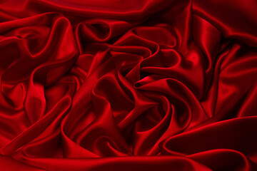 Fototapeta premium Rich and luxury red silk fabric texture background.