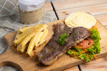 grilled steak with french fries