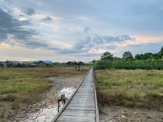 Wood bridge and village 