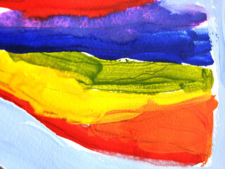 Colorful brush paint strokes on paper surface. Paint marbled texture of rainbow stripes