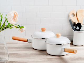 Enamel cooking pot on kitchen countertop