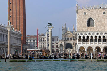 The columns at the beginning of Piazza San Marco seen from a boat in the grand canal.