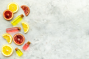 Organic cosmetics essential oil with citrus fruits. Top view