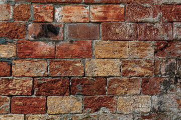 Old grungy smudged retro grimy wall of Italy tower. Uneven dirty peeled red cellar worn. Ruined solid bumpy stiff pitted blocks. Shabby vintage messy ragged holes brickwall for 3D grunge design city