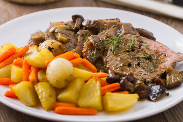 Roast Beef with Potatoes and Carrots. High quality photo.