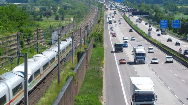 Weilbach, Germany - June 14, 2021: Large trucks and dense traffic on autobahn A3 near Wiesbadener Kreuz. The Bundesautobahn 3 (abbreviated as BAB 3 or A 3) is a highway in Germany that links the borde