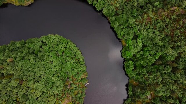 Aerial top view of natural canyon Vltava river like a horseshoe shape from Maj viewpoint.