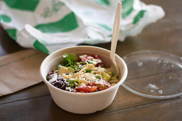 Biodigradable take out container with healthy meal