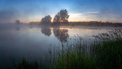 Obraz na płótnie Canvas morning landscape with fog on the bank of the Ural river, Russia