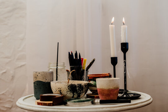 Details of painter studio with decorative elements on the table  