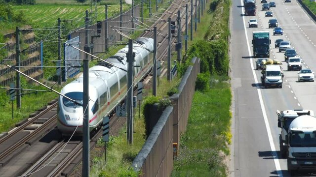 Weilbach, Germany - June 14, 2021: Large trucks and dense traffic on autobahn A3 near Wiesbadener Kreuz. The Bundesautobahn 3 (abbreviated as BAB 3 or A 3) is a highway in Germany that links the borde